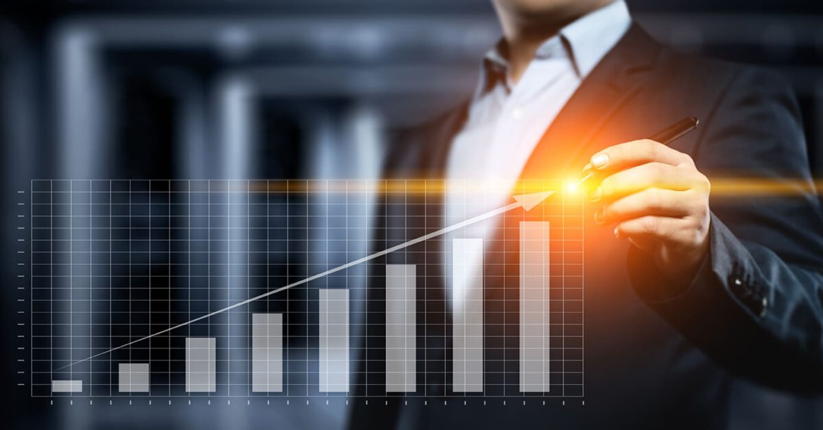 man with increasing bar graph hologramn
