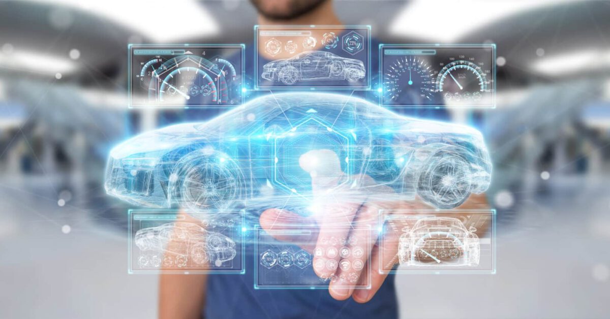 man touching hologram of a car