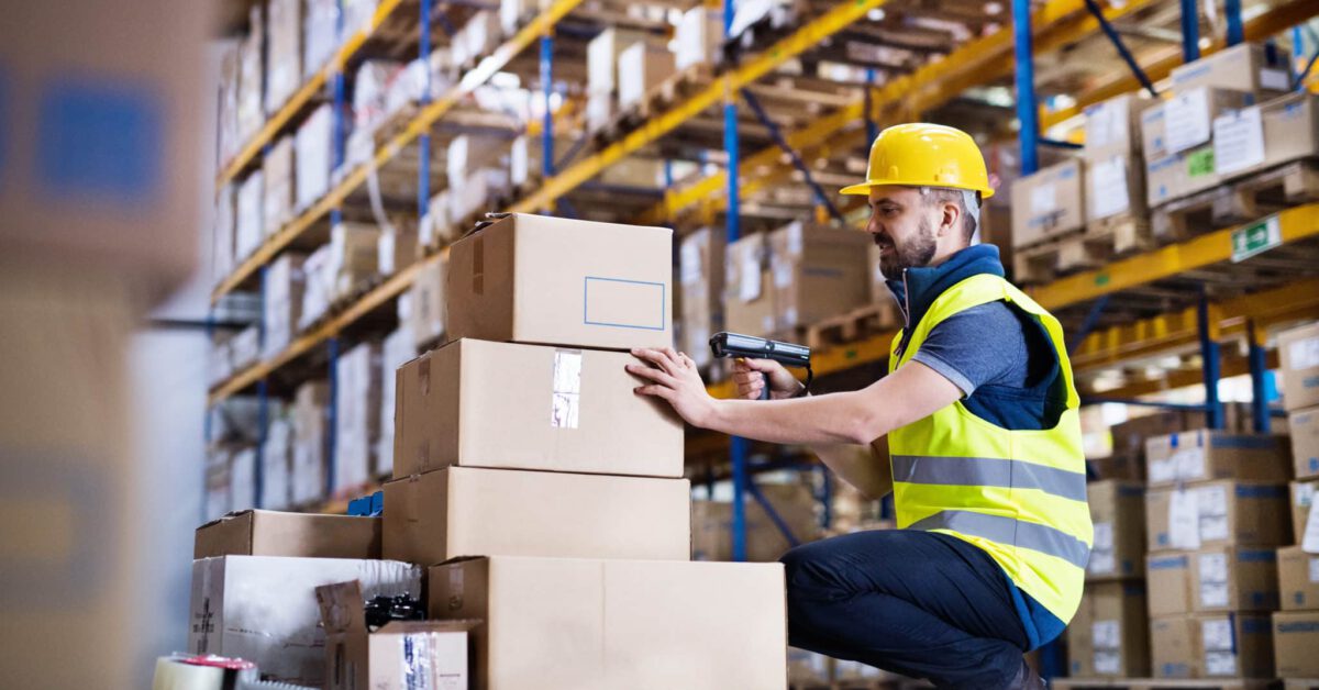 worker with barcode scanner