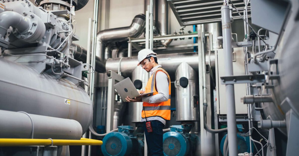 factory worker using laptop